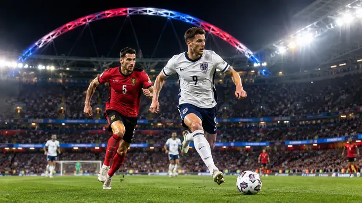England vs Albania match action at Wembley as an England striker races past an Albania defender