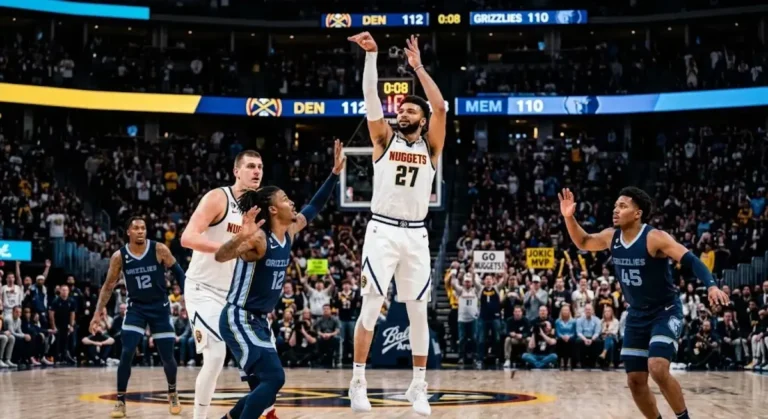 Jamal Murray shooting a three-pointer for the Denver Nuggets against the Memphis Grizzlies during an NBA game at Ball Arena